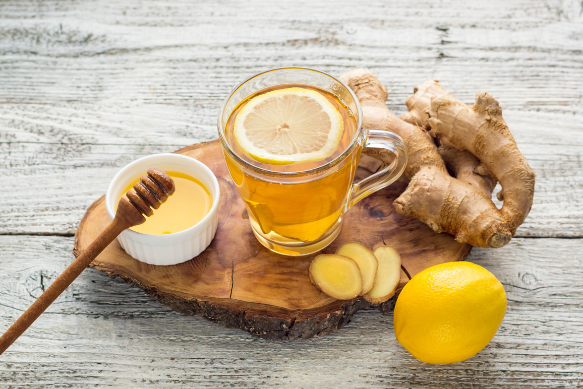 A cup of honey lemon ginger tea to boost immunity naturally with Traditional Chinese Medicine.